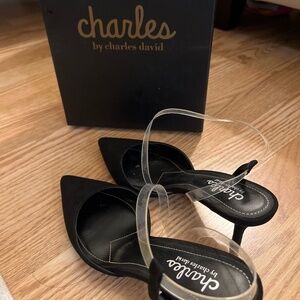 Black suede mid-heel clear straps